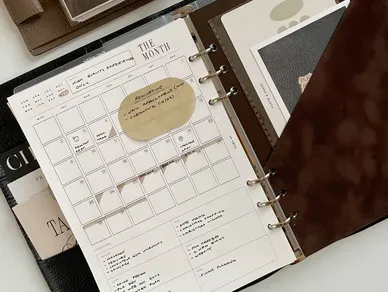 Open planner with calendar and notes