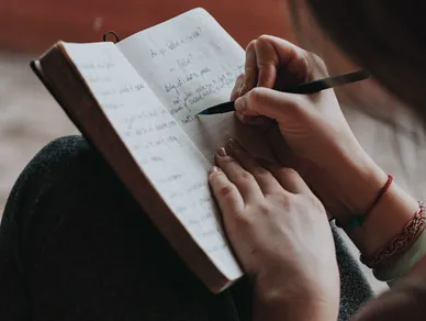 Hand writing in notebook